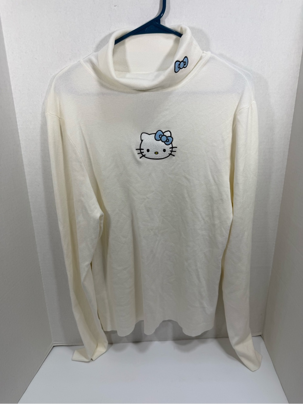 Forever 21 Cream Hello Kitty Turtleneck with Light Blue Bow